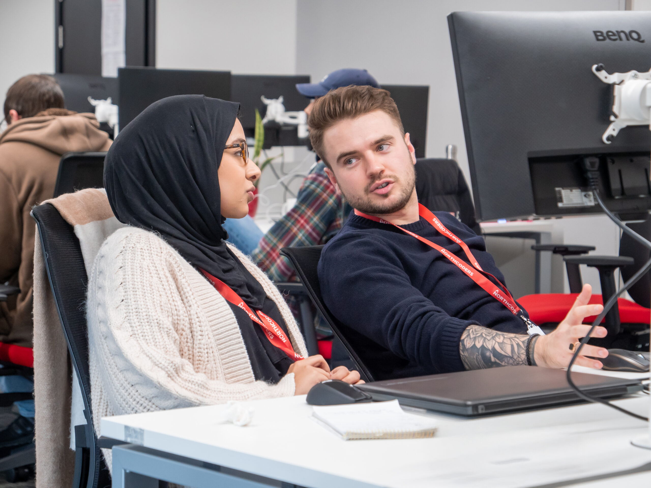 2 students discuss code