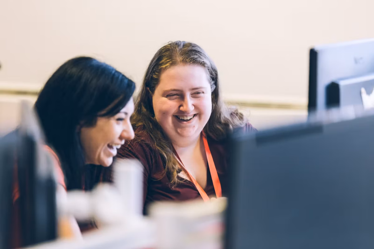 two woman at a computer